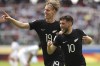 New Zealand's Jay Herdman, right, celebrates with teammate Kian Donkers after scoring the second goal against Uzbekistan during a FIFA U-20 World Cup group A soccer match at Madre De Ciudades stadium in Santiago Del Estero, Argentina, Tuesday, May 23, 2023. Jay Herdman, son of Toronto FC coach John Herdman, has been named to New Zealand's Olympic soccer team. THE CANADIAN PRESS/AP/Nicolas Aguilera