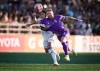 Pacific FC's Josh Heard, front right, is taken down by Vancouver Whitecaps' Bjorn Inge Utvik as they vie for the ball during the first half of a Canadian Championship semifinal soccer match, in Langford, B.C., on Wednesday, July 10, 2024. THE CANADIAN PRESS/Darryl Dyck
