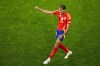 Spain's Lamine Yamal celebrates scoring his side's first goal during a semifinal match between Spain and France at the Euro 2024 soccer tournament in Munich, Germany, Tuesday, July 9, 2024. (AP Photo/Ebrahim Noroozi)