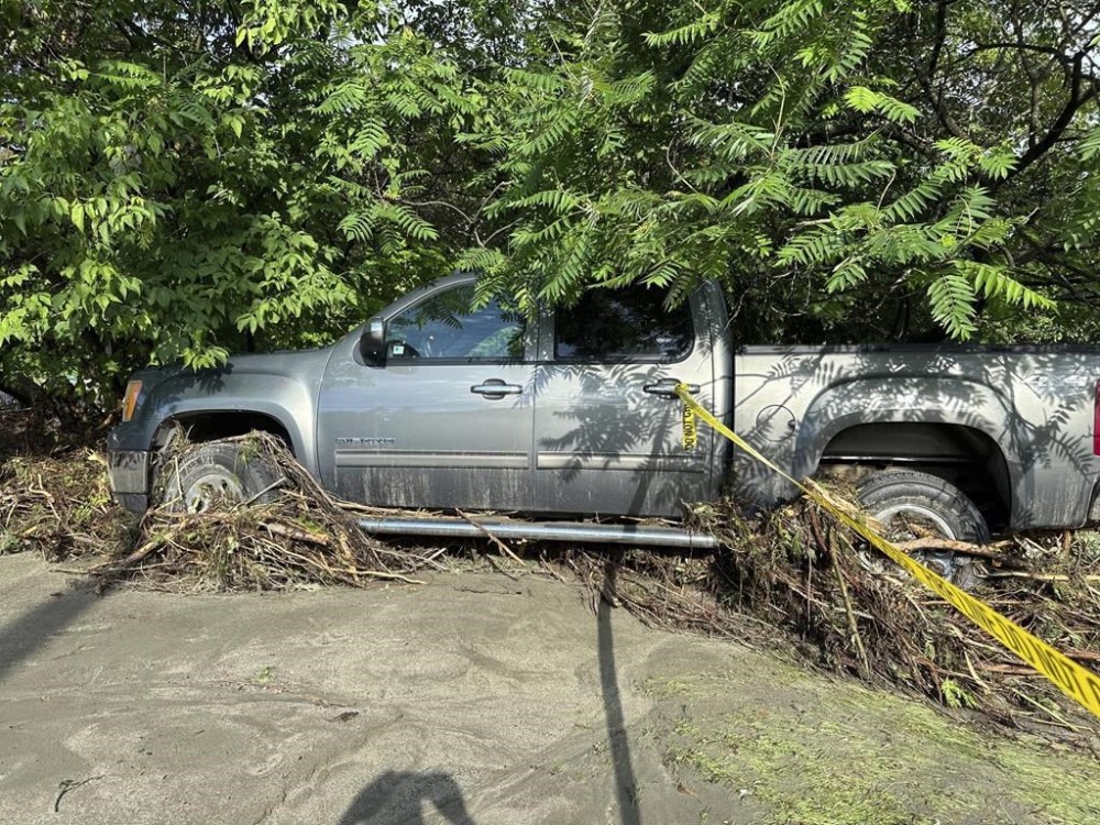 A truck sits damaged by flooding in Plainfield, Vermont, Thursday, July 11, 2024. (AP Photo/Lisa Rathke)