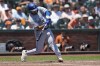 Toronto Blue Jays' Leo Jiménez hits an RBI single against the San Francisco Giants during the fourth inning of a baseball game Thursday, July 11, 2024, in San Francisco. (AP Photo/Godofredo A. Vásquez)