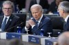 FILE - President Joe Biden, center, makes opening remarks during the NATO summit in Washington, July 10, 2024. It's been two weeks since Biden's debate with Donald Trump and there's rampant gloom in the party about Biden's chances in the fall if he stays in the race. On Thursday, July 11, the 11th lawmaker joined the list of Democrats calling on Biden to end his candidacy. After days of reckoning, many more are known to be harboring that wish. (AP Photo/Jacquelyn Martin)