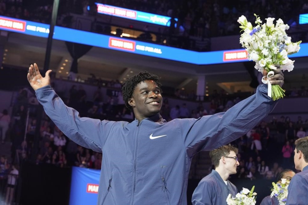 Frederick Richard smiles after being named to the 2024 Olympic team at the United States Gymnastics Olympic Trials on Saturday, June 29, 2024, in Minneapolis. (AP Photo/Charlie Riedel)