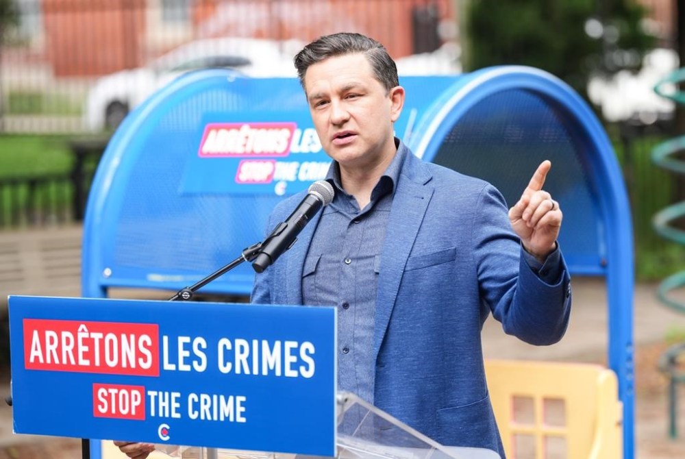 Federal Conservative Leader Pierre Poilievre speaks to the media during a press conference in Montreal, Friday, July 12, 2024. THE CANADIAN PRESS/Christinne Muschi