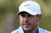 FILE - Brooks Koepka waves after making a putt on the second hole during the first round of the U.S. Open golf tournament Thursday, June 13, 2024, in Pinehurst, N.C. Koepka is expected to play in the 151st British Open, which starts Thursday, July 18, at Royal Liverpool. (AP Photo/George Walker IV, File)