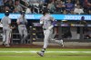 Colorado Rockies' Brendan Rodgers runs the bases after hitting a home run during the seventh inning of a baseball game against the New York Mets, Friday, July 12, 2024, in New York. (AP Photo/Frank Franklin II)