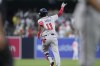 Atlanta Braves' Orlando Arcia rounds the bases after hitting a two-run home run during the fifth inning of a baseball game against the San Diego Padres, Friday, July 12, 2024, in San Diego. (AP Photo/Gregory Bull)