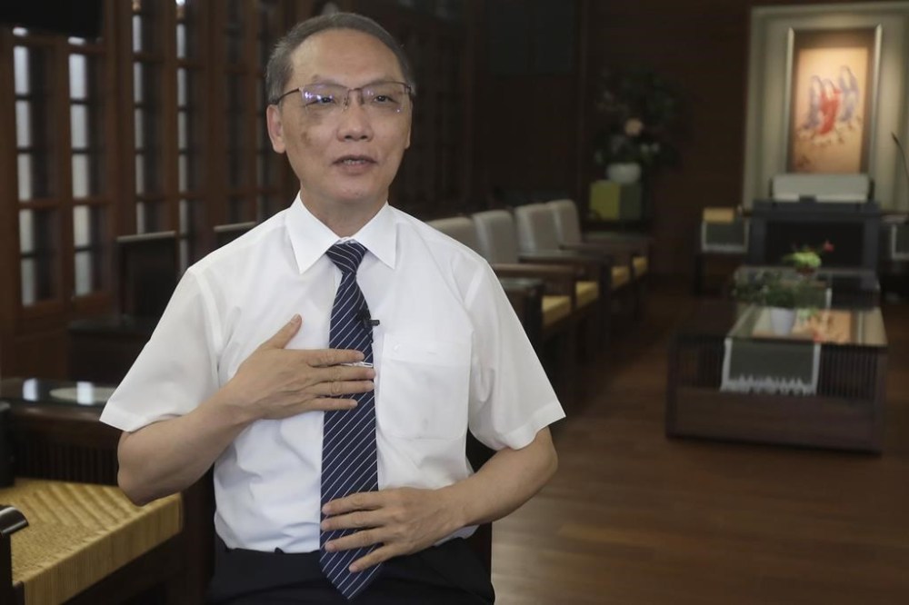 Tzu Chi CEO Po-wen Yen speaks during an interview at the Jing Si Abode in Hualien, Taiwan, Thursday, July 6, 2023. The former head of the United Microelectronics Corporation, a major semi-conductor manufacturer in Taiwan, is well aware of the criticism about the organization’s wealth. “You can say that all the resources we gathered is to help to the fullest extent possible when disaster strikes,” he says, adding that their budget also funds other global chapters. (AP Photo/Chiang Ying-ying)