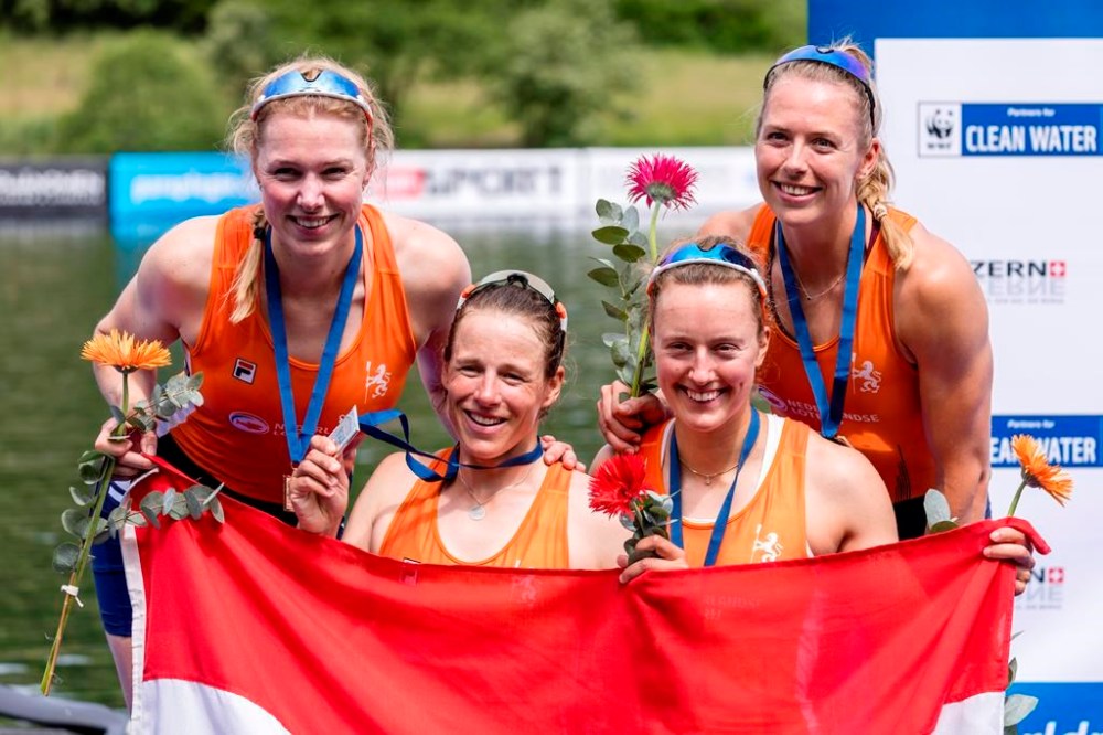 FILE - From left, Netherland's Marloes Oldenburg, Hermine Drenth, Tinka Offereins and Benthe Boonstra celebrate taking second place in the Women's Four Final A, at the 2024 World Rowing Cup at Rotsee, Sunday, May 26, 2024, in Lucerne, Switzerland. Two years after a nasty bicycle crash broke her back in multiple places, Oldenburg will be rowing again at the Paris Olympics. (Philipp Schmidli/Keystone via AP, File)