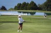 Lauren Coughlin plays on the 18th hole during the third round of the Evian Championship women's golf tournament, in Evian, eastern France, Saturday, July 13, 2024. (AP Photo/Laurent Cipriani)