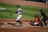 New York Yankees' Aaron Judge, left, watches his double off Baltimore Orioles pitcher Grayson Rodriguez during the third inning of a baseball game, Saturday, July 13, 2024, in Baltimore. (AP Photo/Terrance Williams)
