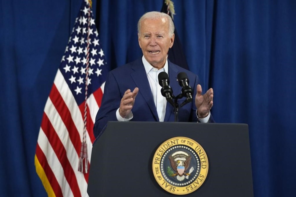 President Joe Biden speaks, Saturday, July 13, 2024, in Rehoboth Beach, Del., addressing news that gunshots rang out at Republican presidential candidate former President Donald Trump's Pennsylvania campaign rally. (AP Photo/Manuel Balce Ceneta)