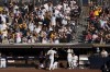 Fans applaud San Diego Padres starting pitcher Dylan Cease (84) as he exits during the sixth inning of a baseball game against the Atlanta Braves, Saturday, July 13, 2024, in San Diego. (AP Photo/Gregory Bull)