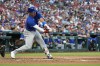 Chicago Cubs' Seiya Suzuki hits an RBI single during the second inning in the second baseball game of a doubleheader against the St. Louis Cardinals Saturday, July 13, 2024, in St. Louis. (AP Photo/Jeff Roberson)