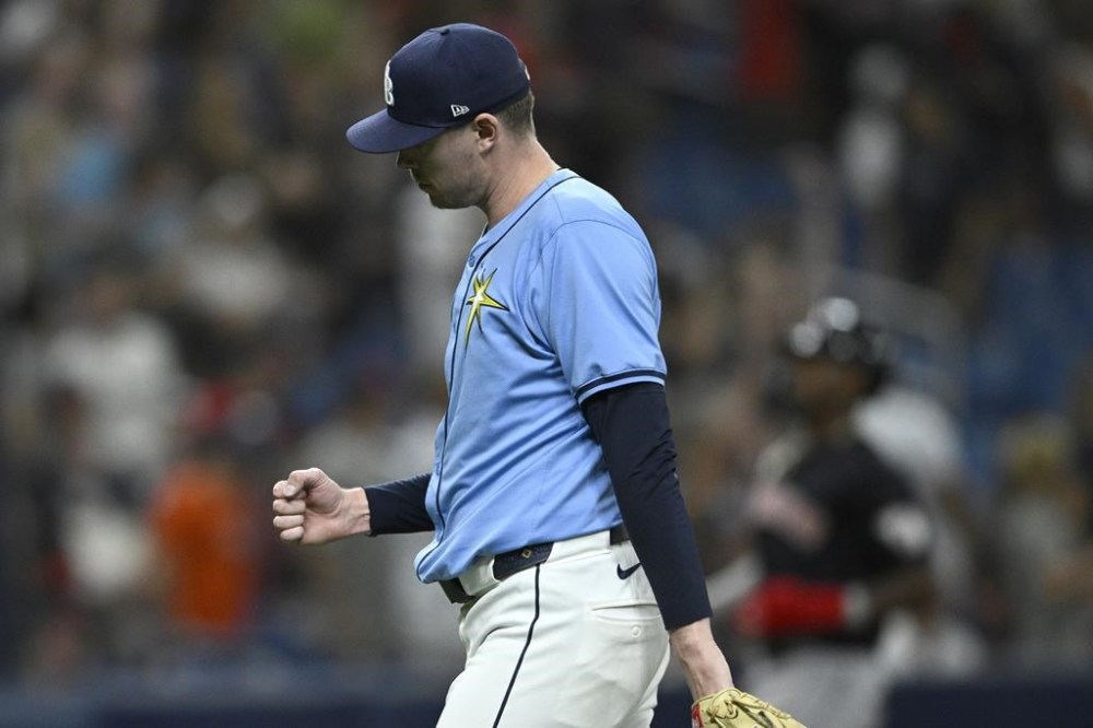 Tampa Bay Rays pitcher Pete Fairbanks reacts after getting the final out of the ninth inning and the save in a baseball game against the Cleveland Guardians, Sunday, July 14, 2024, in St. Petersburg, Fla. (AP Photo/Phelan M. Ebenhack)