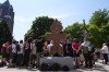 Members of the Coalition to March on the RNC stand during a news conference ahead of the 2024 Republican National Convention, Sunday, July 14, 2024, in Milwaukee. (AP Photo/Jae C. Hong)