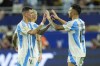 Argentina's Angel Di Maria, left, greets teammate Nicolás Gonzalez as he leaves the field during the Copa America final soccer match against Colombia in Miami Gardens, Fla., Monday, July 15, 2024. (AP Photo/Rebecca Blackwell)