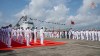 In this photo taken from video released by Russian Defense Ministry Press Service Monday, July 15, 2024, Russian military sailors attend a welcome ceremony of their joint naval forces exercise at a port in Zhanjiang, Guangdong province, China, Sunday July 14, 2024. China and Russia's naval forces have kicked off a joint exercise at a military port in southern China on Sunday, official news agency Xinhua reported, days after NATO allies called Beijing a 