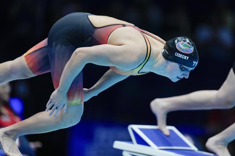 FILE - Katie Ledecky swims during a Women's 800 freestyle preliminary heat, June 21, 2024, at the US Swimming Olympic Trials in Indianapolis. (AP Photo/Michael Conroy, File)