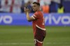 Switzerland's Xherdan Shaqiri acknowledges the applause from their supporters after their loss in the quarterfinal match against England at the Euro 2024 soccer tournament in Duesseldorf, Germany, Saturday, July 6, 2024. (AP Photo/Thanassis Stavrakis)