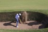 Justin Thomas of the United States plays out of a bunker on the 5th hole during a practice round for the British Open Golf Championships at Royal Troon golf club in Troon, Scotland, Monday, July 15, 2024. (AP Photo/Peter Morrison)