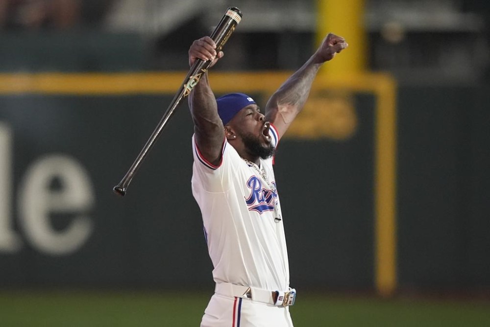 Adolis Garcia, of the Texas Rangers, is introduced before the MLB baseball All-Star Home Run Derby, Monday, July 15, 2024, in Arlington, Texas. (AP Photo/LM Otero)
