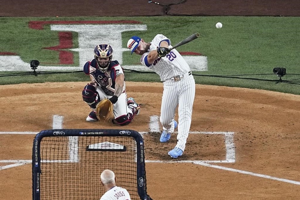 Pete Alonso, of the New York Mets, hits a home run during the first round of the MLB baseball All-Star Home Run Derby, Monday, July 15, 2024, in Arlington, Texas. (AP Photo/Tony Gutierrez)