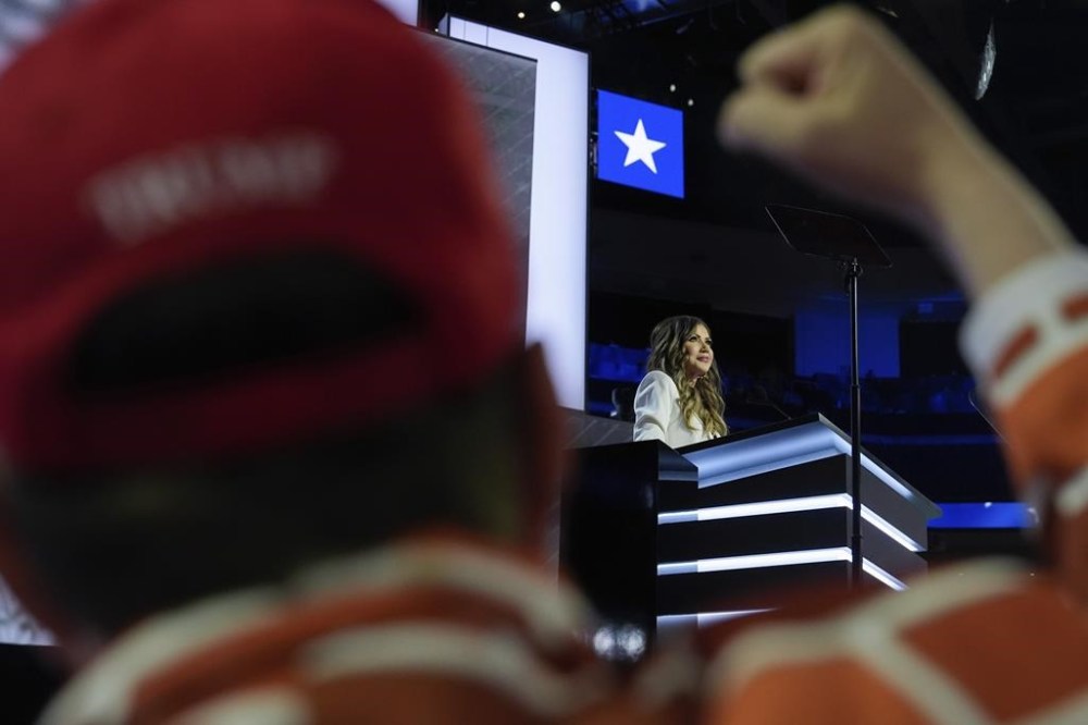 A delegate reacts as Gov. Kristi Noem, R-ND., speaks during the Republican National Convention Monday, July 15, 2024, in Milwaukee. (AP Photo/Julia Nikhinson)