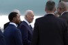 President Joe Biden greets people after arriving at Harry Reid International Airport in Las Vegas, Monday, July 15, 2024. (AP Photo/Susan Walsh)