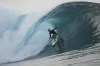 FILE - A surfer rides a wave in Teahupo'o, Tahiti, French Polynesia, Saturday, Jan. 13, 2024. The world-famous surf spot is set to host the 2024 Paris Olympics surfing competition. (AP Photo/Daniel Cole, File)