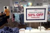 FILE - A holiday sale sign is displayed at a retail store in Rosemont, Ill., June 25, 2024. On Tuesday, July 16, 2024, the Commerce Department releases U.S. retail sales data for June. (AP Photo/Nam Y. Huh, File)