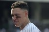 New York Yankees' Aaron Judge stands in the dugout during the eighth inning of a baseball game against the Boston Red Sox, Saturday, July 6, 2024, in New York. (AP Photo/Pamela Smith)