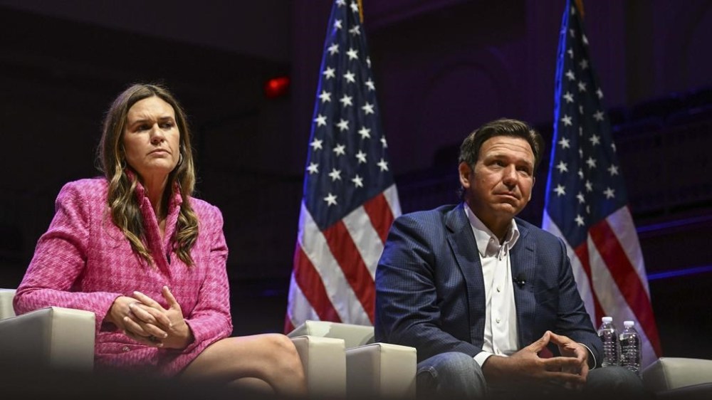 Arkansas Gov. Sarah Huckabee Sanders, and Florida Gov. Ron DeSantis take questions during a Mom's for Liberty function during the second day of the 2024 Republican National Convention near the Fiserv Forum, Tuesday, July 16, 2024, in Milwaukee. (AP Photo/Joe Lamberti)