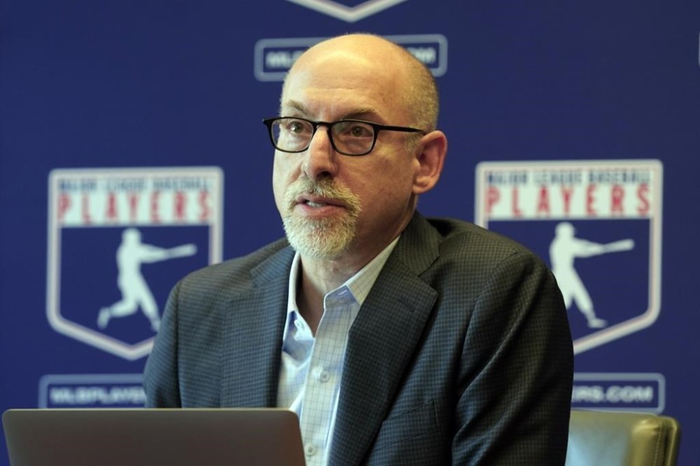FILE - Major League Baseball Players Association Senior Director, Collective Bargaining & Legal, Bruce Meyer answers a question at a press conference in their offices in New York, on March 11, 2022. Baseball players' association head Tony Clark vowed to keep the union's deliberations internal following a failed attempt in March 2024 to remove his chief labor negotiator. Harry Marino, a former union lawyer who helped organize minor leaguers, was rebuffed when he attempted to get the union's executive board to oust deputy executive director Meyer, who led talks for the 2022 collective bargaining agreement. (AP Photo/Richard Drew, File)