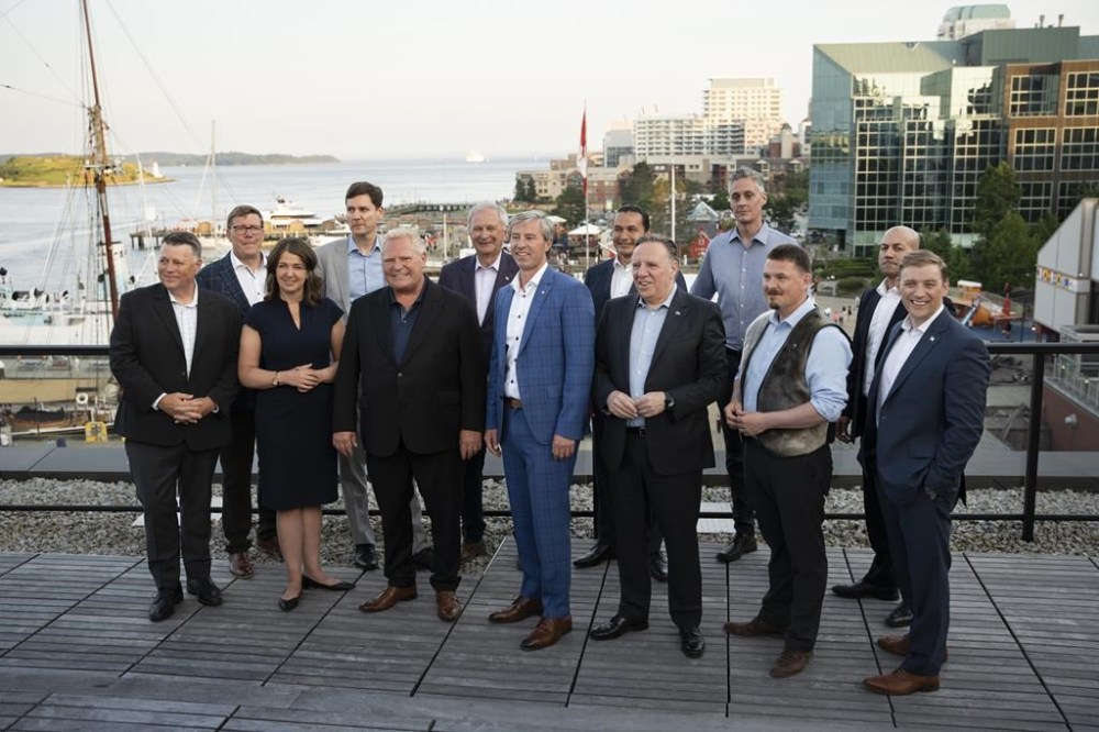 Canada's premiers gather for a group photo during the Council of the Federation meetings in Halifax on Monday, July 15, 2024. The premiers of the 10 provinces and three territories are in Halifax this week for a three-day gathering hosted by Nova Scotia Premier Tim Houston. THE CANADIAN PRESS/Darren Calabrese