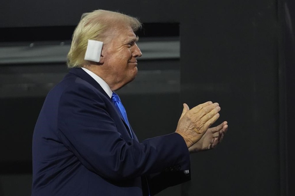 Republican presidential candidate former President Donald Trump is introduced during the Republican National Convention Tuesday, July 16, 2024, in Milwaukee. (AP Photo/Paul Sancya)
