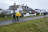 Spectators walk past 