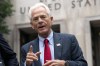 FILE - Former Trump White House advisor Peter Navarro speaks to the media as he leaves federal court in Washington, Aug. 11, 2022. Navarro has been released from prison in Florida after completing his sentence for a contempt of Congress conviction and is expected to speak hours later at the Republican National Convention in Milwaukee. The federal Bureau of Prisons says Navarro was released Wednesday after serving four months for refusing to cooperate with a congressional investigation into the Jan. 6, 2021, attack on the U.S. (AP Photo/Jose Luis Magana)