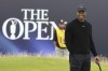 Tiger Woods of the United States waits to putt on the 18th green during a practice round ahead of the British Open Golf Championships at Royal Troon golf club in Troon, Scotland, Wednesday, July 17, 2024. (AP Photo/Scott Heppell)