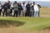 Tommy Fleetwood of England chips onto the first green during a practice round ahead of the British Open Golf Championships at Royal Troon golf club in Troon, Scotland, Wednesday, July 17, 2024. (AP Photo/Scott Heppell)