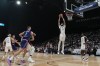 United States' Anthony Davis collects the ball during an exhibition basketball match between Serbia and the United States at the USA Basketball Showcase, ahead of the 2024 Paris Olympic basketball tournament, in Abu Dhabi, United Arab Emirates, Wednesday, July 17, 2024. (AP Photo/Altaf Qadri)
