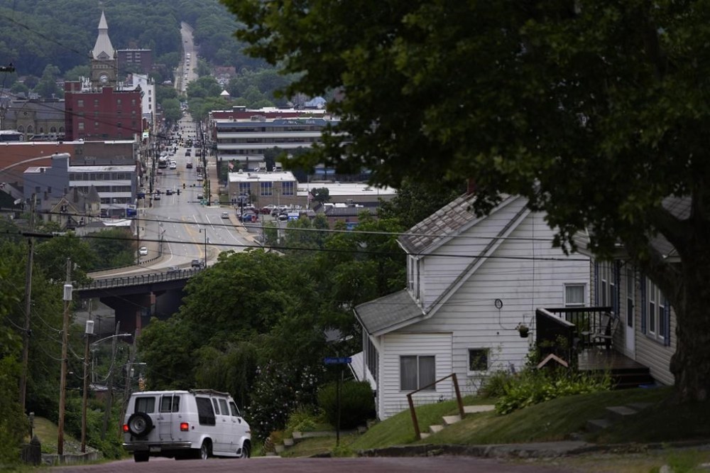 Traffic travels down Main Street in Butler, Pa., Wednesday, July 17, 2024. (AP Photo/Matt Slocum)