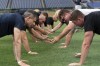 Military service members workout during the high intensity interval training for members of the military at Nationals Park, Tuesday, July 16, 2024 in Washington. ( AP Photo/Jose Luis Magana)