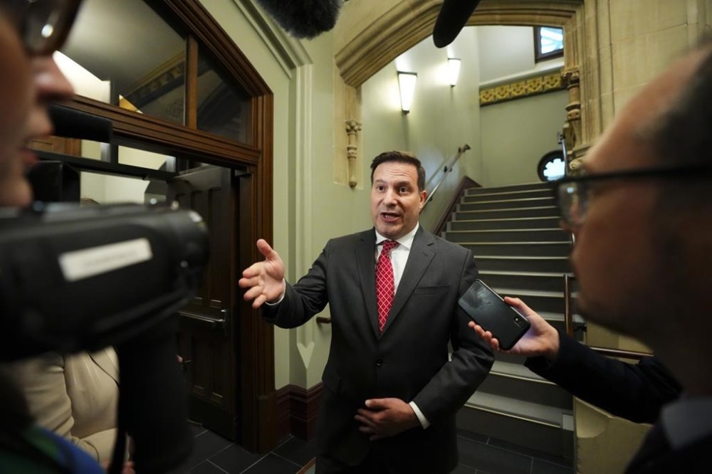 Marco Mendicino speaks to reporters on Parliament Hill in Ottawa on Tuesday, June 20, 2023. Former public safety minister Mendicino is calling for creation of
