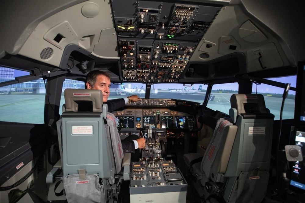 Chief pilot Gerald Skocdopole with Canadian North flies the airline's new state-of-the-art Boeing 737NG full-flight simulator in Edmonton, on Wednesday July 17, 2024. THE CANADIAN PRESS/Jason Franson.