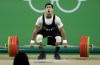 FILE - Mohamed Mahmoud, of Egypt, competes during the men's 77kg weightlifting competition at the 2016 Summer Olympics in Rio de Janeiro, Brazil, Wednesday, Aug. 10, 2016. Weightlifters Mohamed Mahmoud of Egypt and Alexandr Spac of Moldova have returned adverse analytical findings from re-tests of samples from the 2016 Rio Olympics, according to the International Testing Agency, announced this week. (AP Photo/Mike Groll, File)