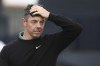Rory McIlroy of Northern Ireland reacts as he walks from the 18th green following his opening round of the British Open Golf Championships at Royal Troon golf club in Troon, Scotland, Thursday, July 18, 2024. (AP Photo/Scott Heppell)