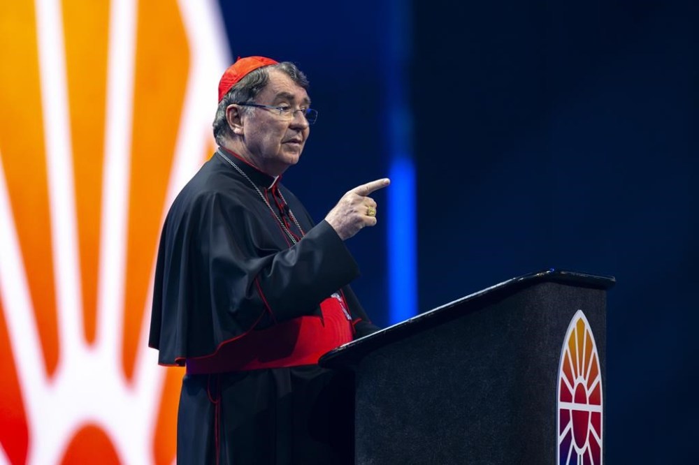 Cardinal Christophe Pierre delivers an address during the National Eucharistic Congress opening ceremonies, July 17, 2024, at Lucas Oil Stadium in Indianapolis. (AP Photo/Doug McSchooler)