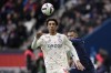FILE - Lille's Leny Yoro controls the ball next to PSG's Kylian Mbappe, right, during the French League One soccer match between Paris Saint-Germain and Lille at the Parc des Princes stadium, in Paris, France, Sunday, Feb. 19, 2023. Manchester United completed the signing of 18-year-old defender Leny Yoro from Lille on Thursday, July 18, 2024. (AP Photo/Christophe Ena, File)