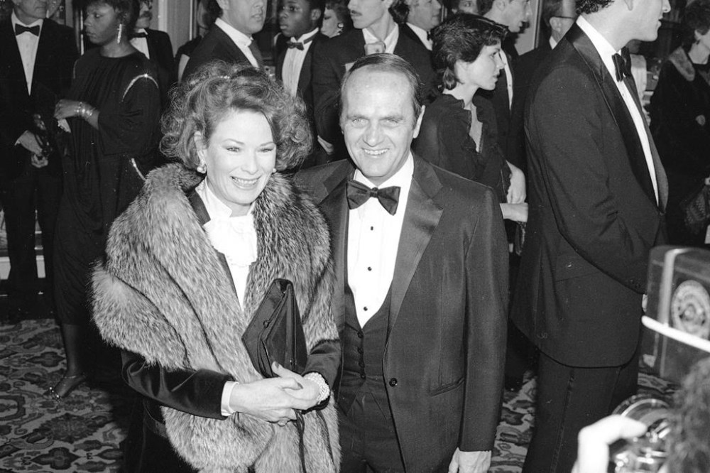 FILE - Comedian Bob Newhart and his wife Ginny arrive at the Golden Globe Awards in Beverly Hills, Calif. on Jan. 26, 1985. Newhart, the deadpan master of sitcoms and telephone monologues, died in Los Angeles on Thursday, July 18, 2024. He was 94. (AP Photo/Lennox McLendon, File)